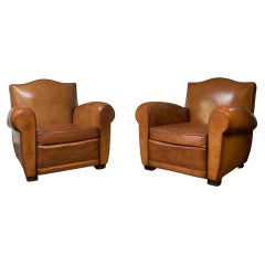 A Fabulous Pair of French Leather Club Chairs Chapeau de Gendarme Models C 1950