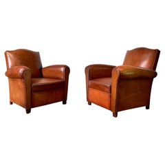 A Fabulous Pair of French Leather Club Chairs Chapeaux de Gendarme, Circa 1950's