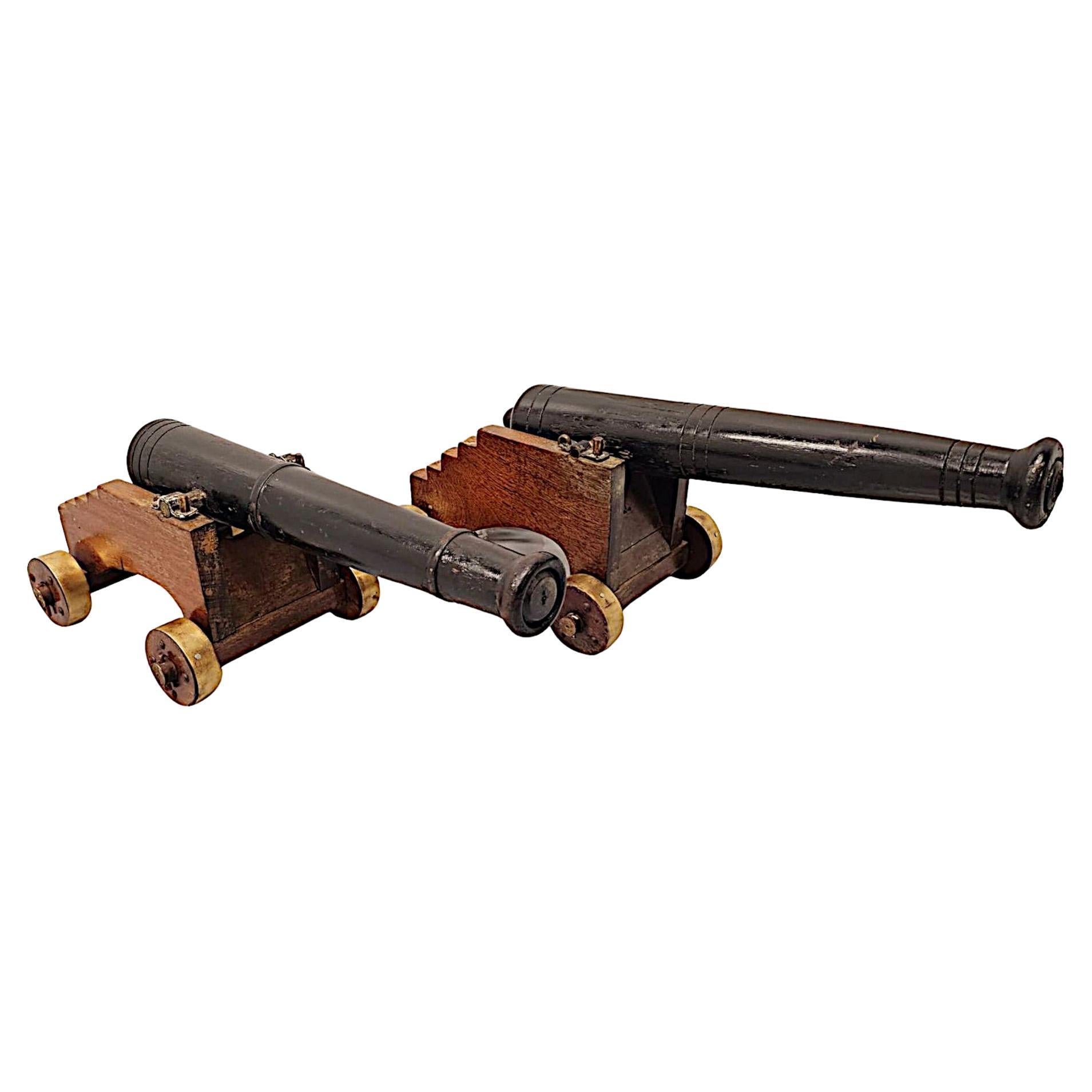 A Fabulous Pair of Late 19th Century Hand Made Miniature Wooden Cannons For Sale