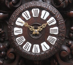 A fabulous quality 19th Century French carved oak wall clock