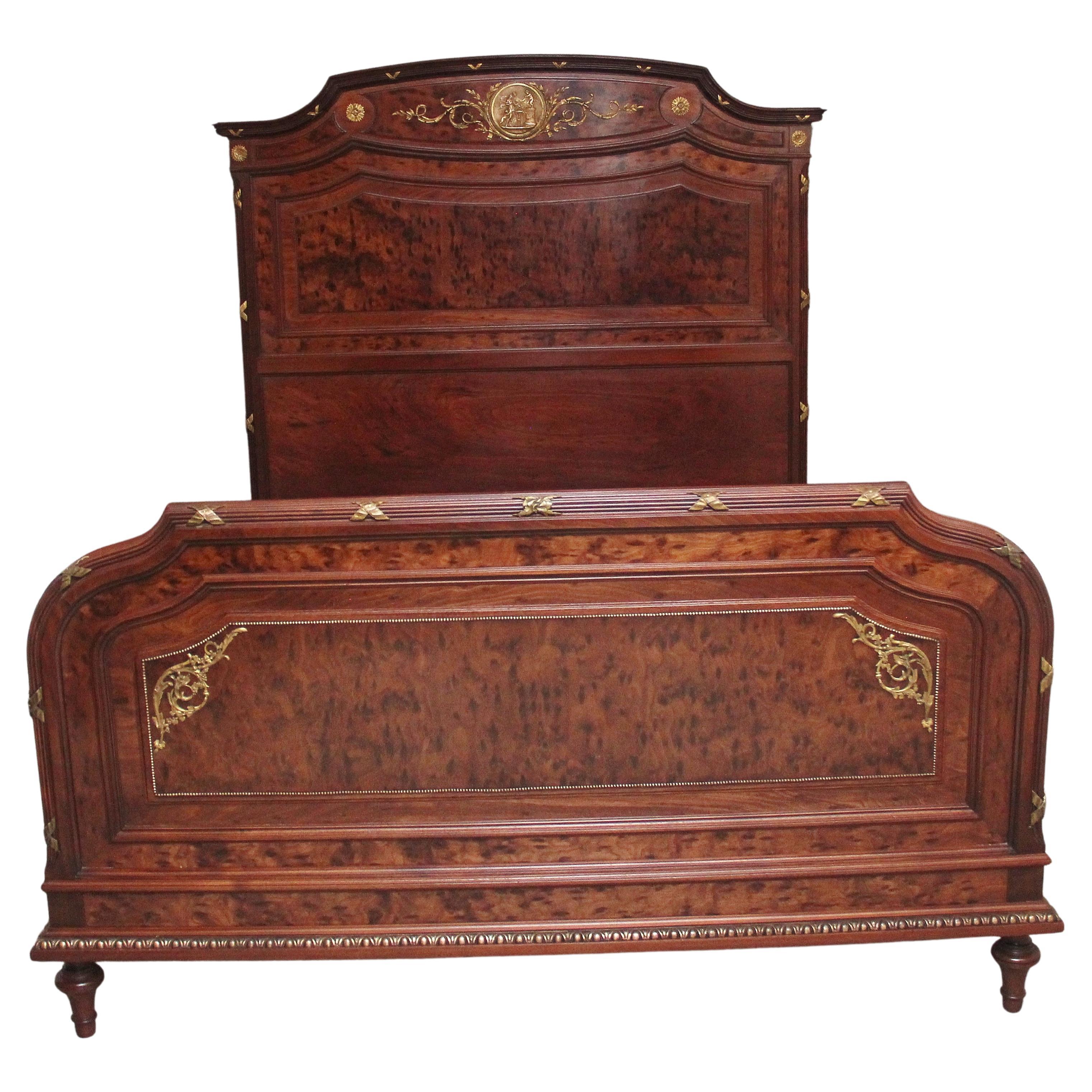 A fabulous quality 19th Century French plum pudding mahogany and brass bed in th For Sale