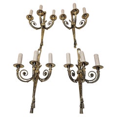 A Fabulous Set of Four Early 20th Century Three Branch Brass Wall Lights