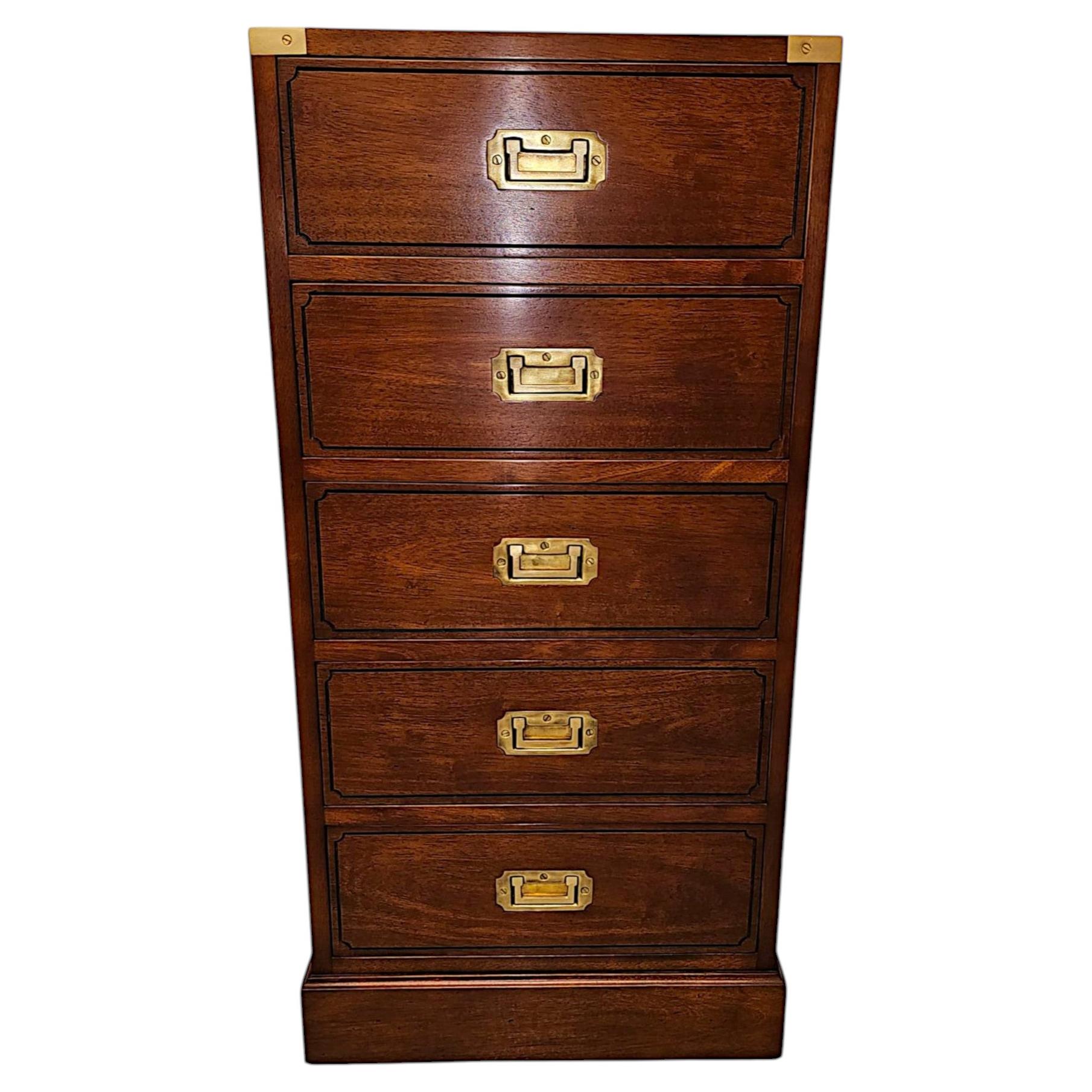 A Fabulous Tall and Narrow Chest of Drawers in the Campaign Style For Sale