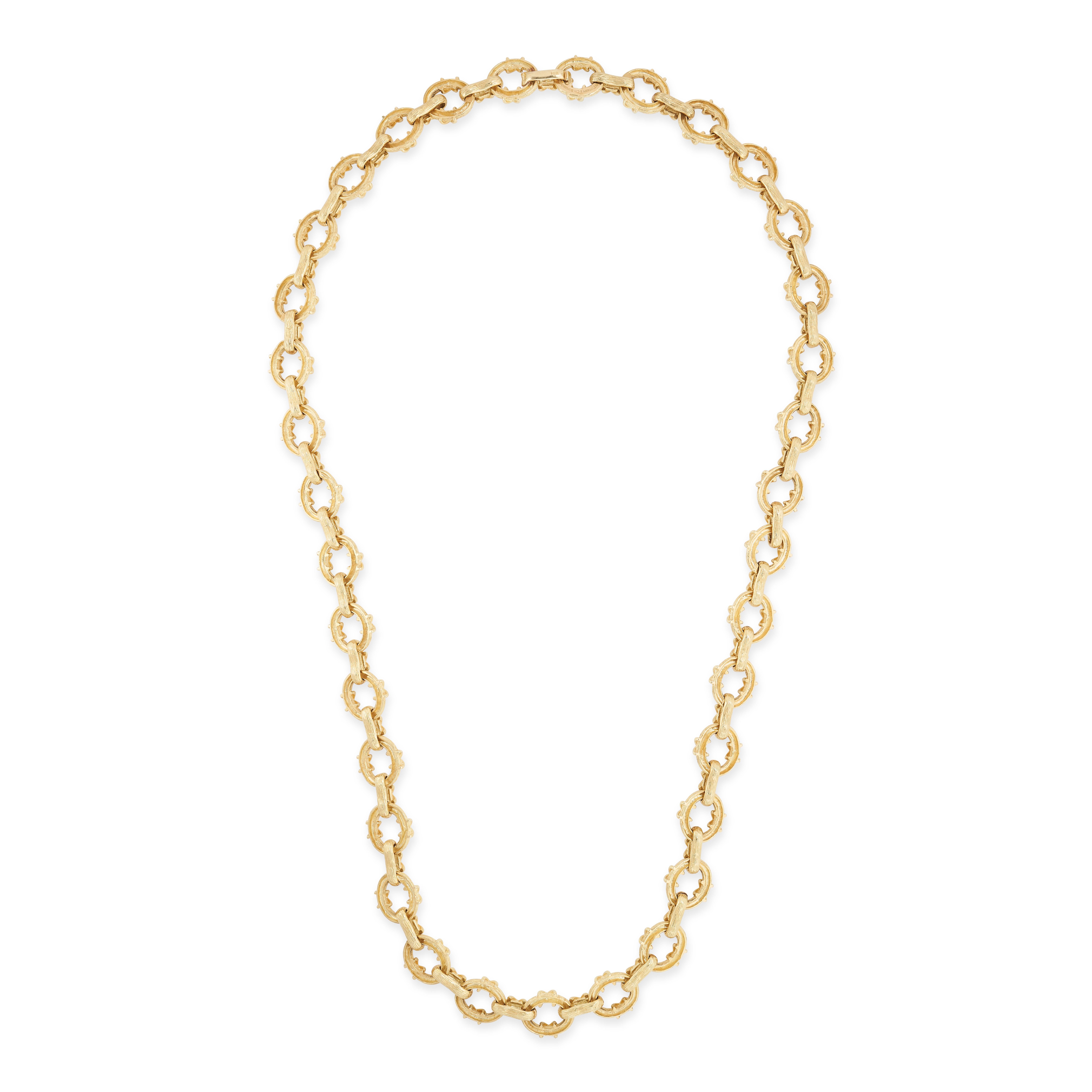 Beautifully crafted in 18ct yellow gold by master designer Jean Schlumberger, this stunning necklace is composed of a row of open circular links accented by 'X' or kiss motifs, symbolic of one of this US heritage brand's most iconic designers. 

-