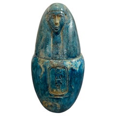 Vaso canopo in ceramica smaltata faience di Imsety, inizio XX secolo
