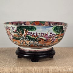 A Famille Rose 'hunt scene' Punch Bowl Qianlong Period