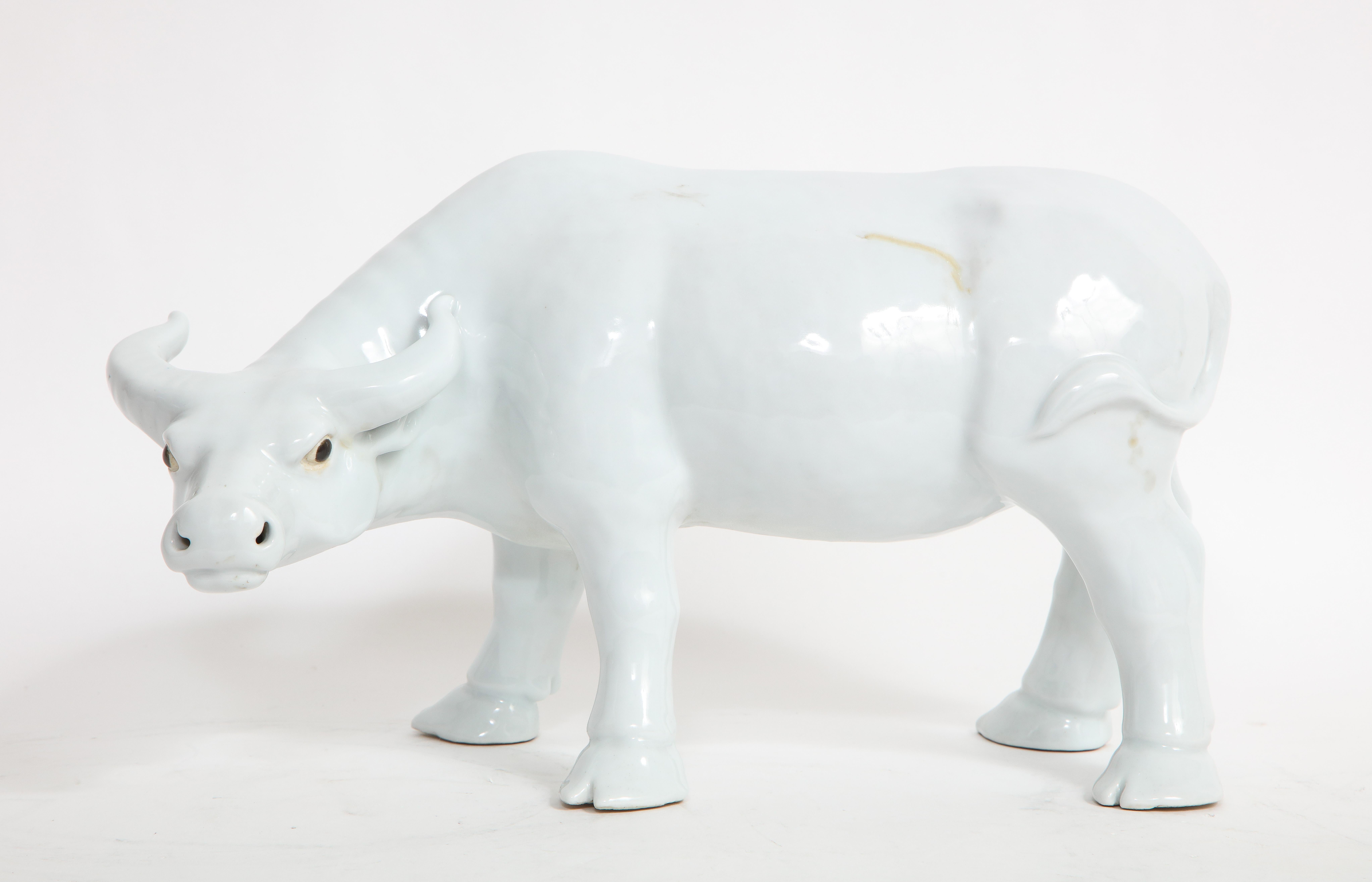 A Fantastic 19th Century Chinese Blanc De Chine Model of a Water Buffalo. Beautifully hand-carved and enameled with a bright white body and black enamel eyes. This piece is really superb and in fabulous condition for its age. In Chinese culture, the
