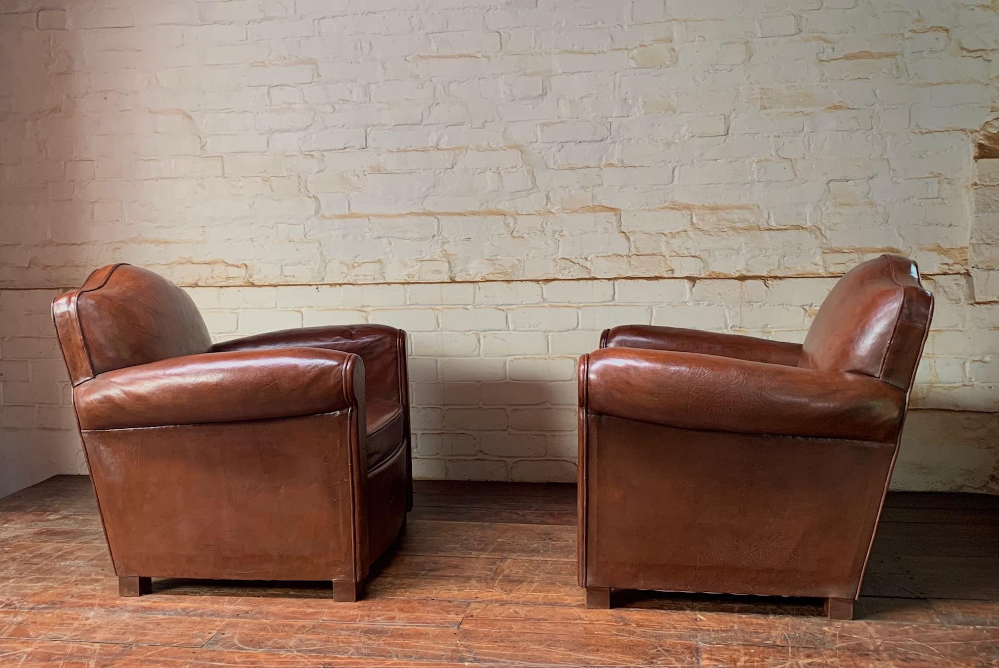 A Fantastic Pair of French leather Club Chairs Chapeau de Gendarme models C1950 In Good Condition For Sale In Hastings, GB