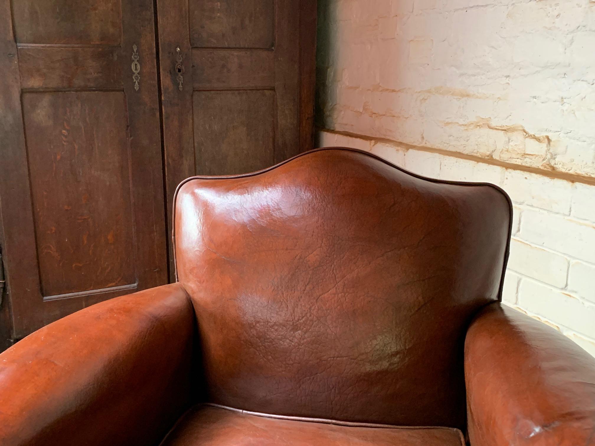 20th Century A Fantastic Pair of French leather Club Chairs Chapeau de Gendarme models C1950 For Sale