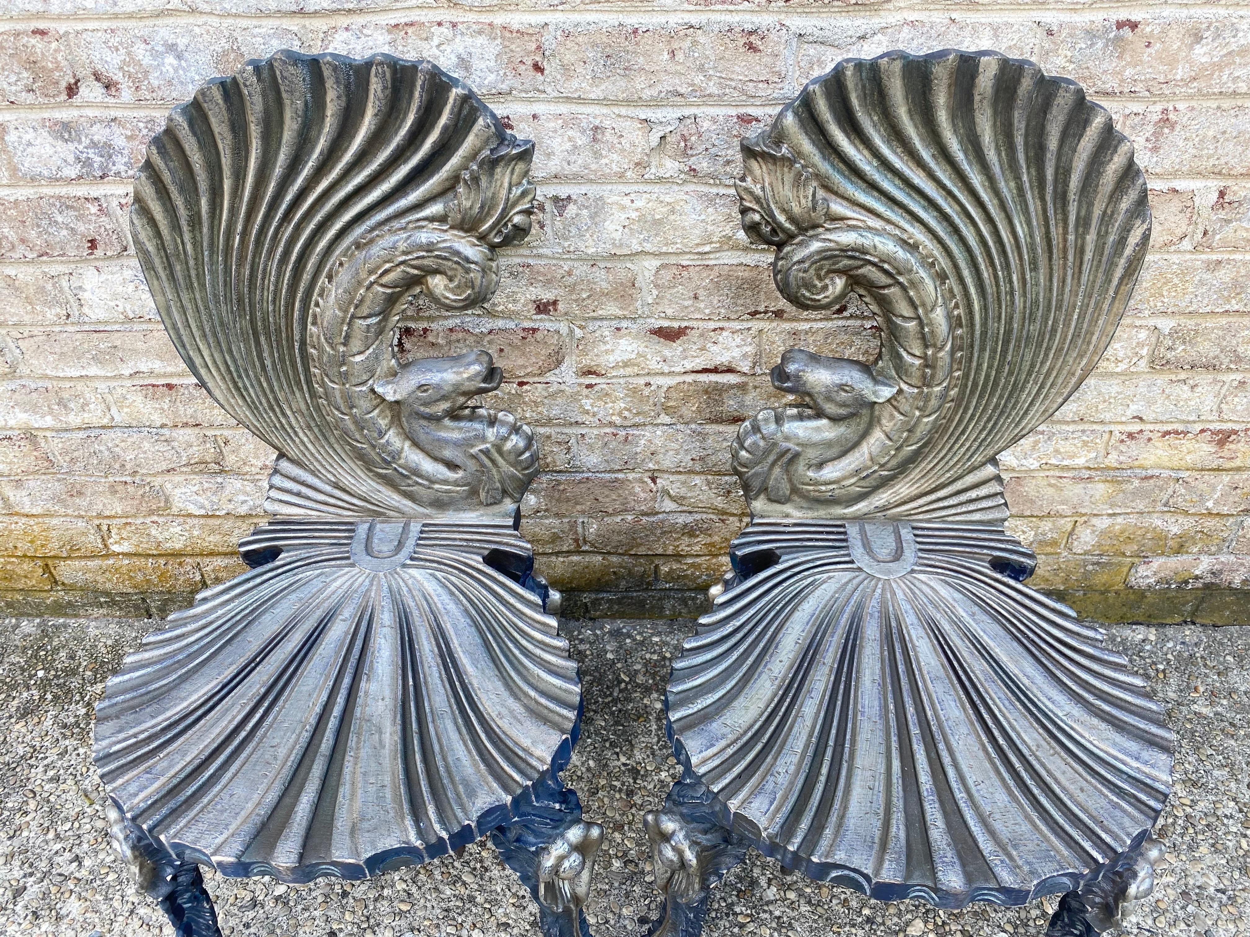 Unique pair of Venetian style grotto chairs with seahorse carved back and scallop seats in a silvered wood.... the legs are carved in the shape of shells.