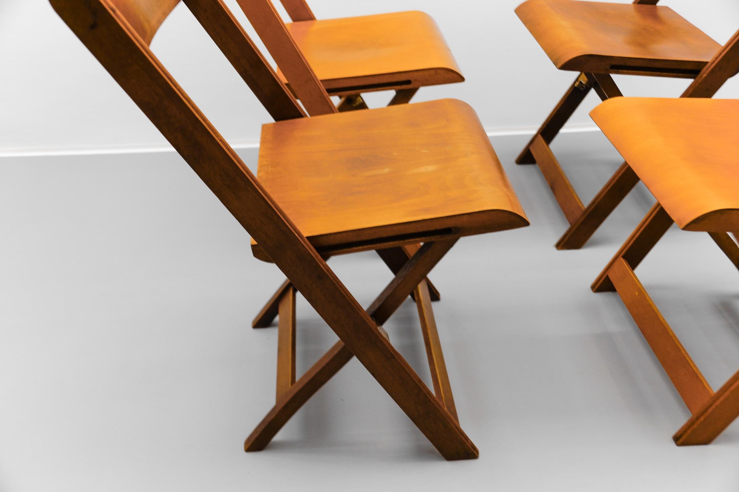 A Fantastic Set of 4 German Cinema Wooden Folding Chairs from the 40s / 50s 1