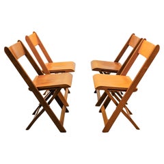 Fantástico juego de 4 sillas plegables de madera de cine alemán de los años 40 / 50