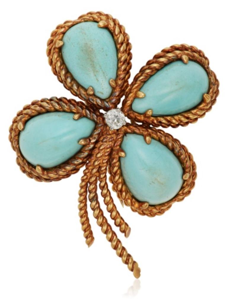 A Fantastic Van Cleef and Arpels Turquoise and Diamond Clover Brooch.  Designed as a clover, pear-shaped cabochon turquoise, round diamond, 18k yellow gold, signed VCA, NY, numbered.

Dimensions: 5.3 x 4.2 cm (2 1/8 x 1 5/8 in)
Gross Weight : 26.1