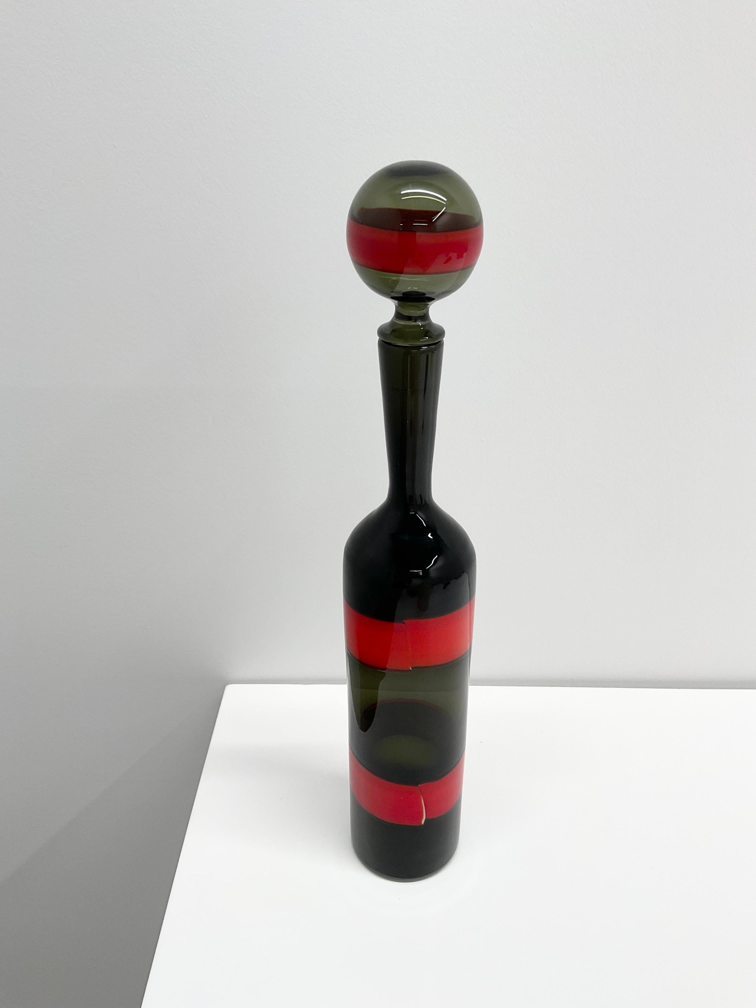 Fulvio Bianconi A Fasce “Orizzontali” stoppered bottle for Venini, Italy, 1960s

Additional Information:
Materials: Polychrome banded glass
Dimensions: 18 3/4” H x 3 1/2” Dia.
Condition: Excellent.