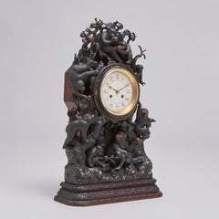 A fascinating antique Japanese Bronze clock depicting a troop of monkeys (Circa