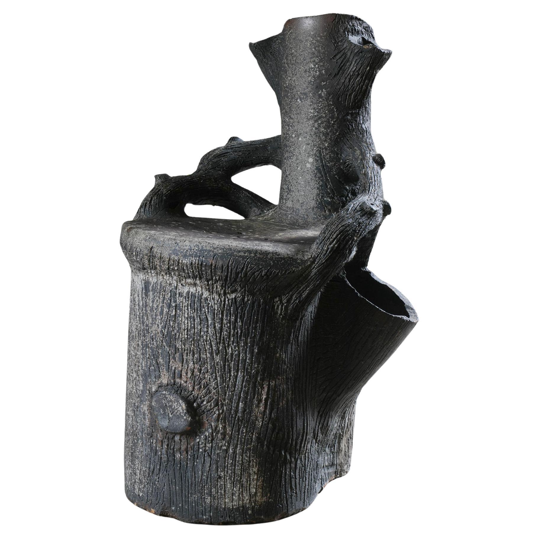 A Faux Bois Grotto Chair by Clayton