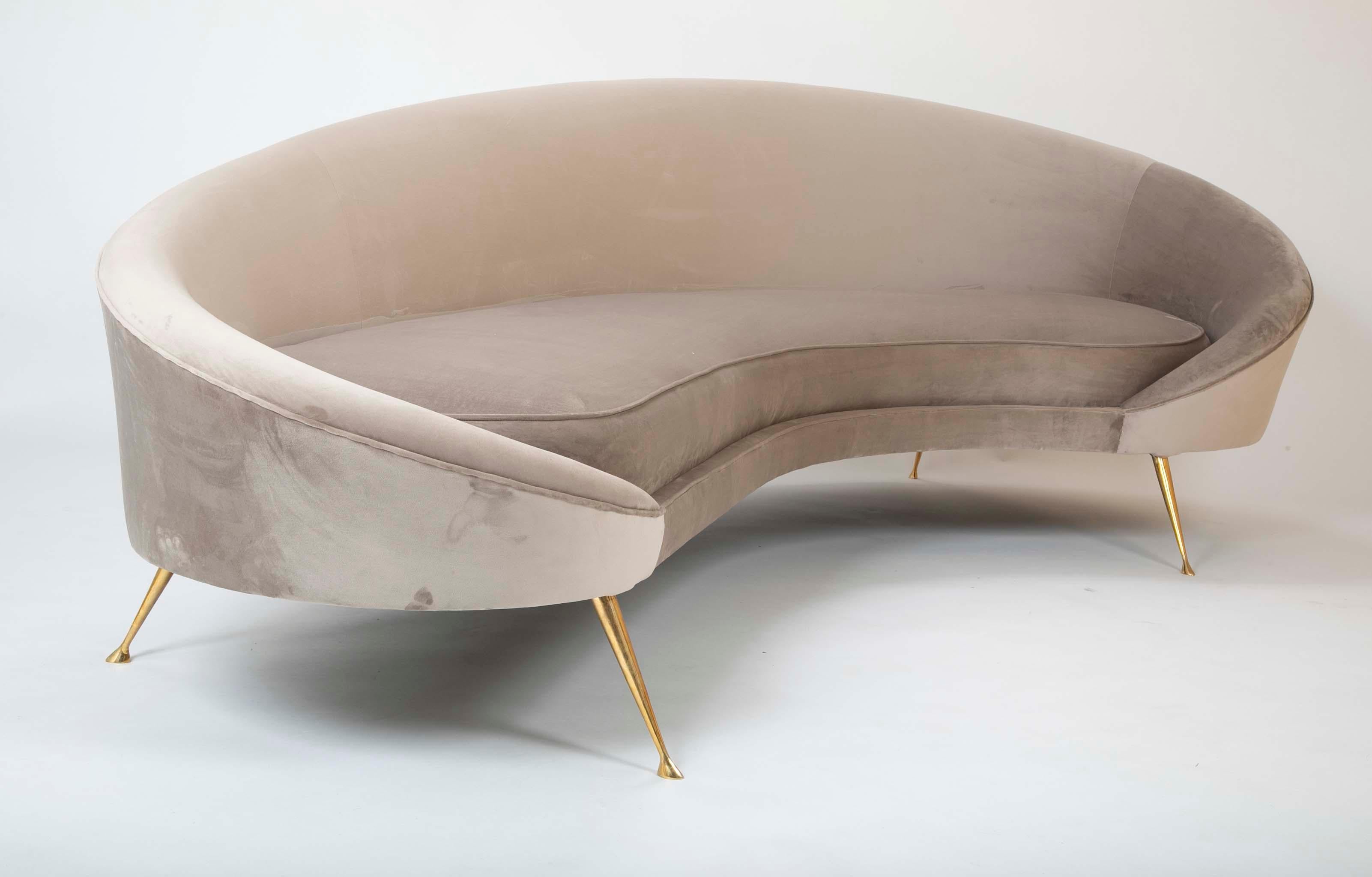 An Italian sofa designed by Federico Munari. Newly upholstered in pewter colored Velvet.
