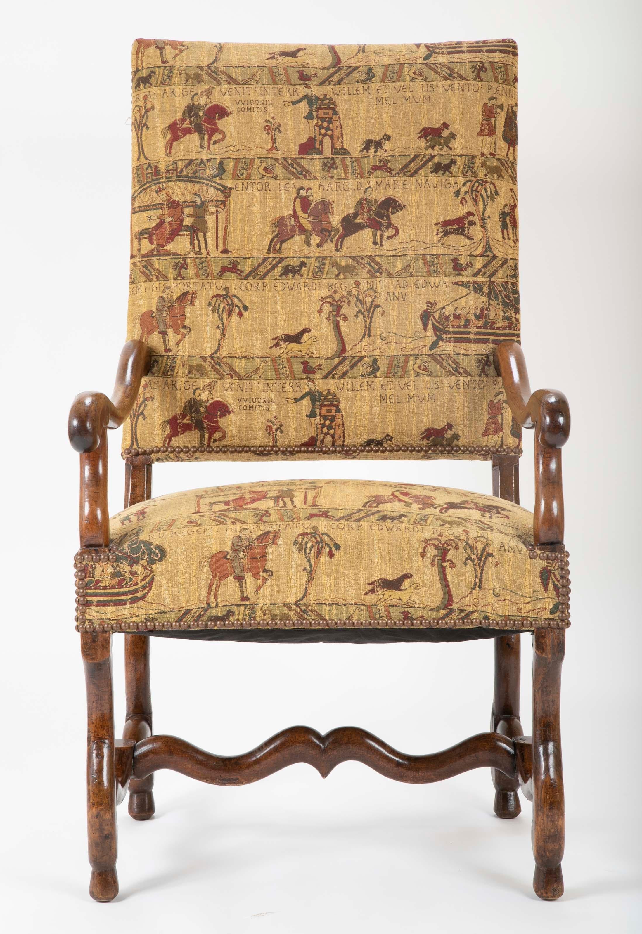 A French Louis XIII walnut armchair, circa 19th century.