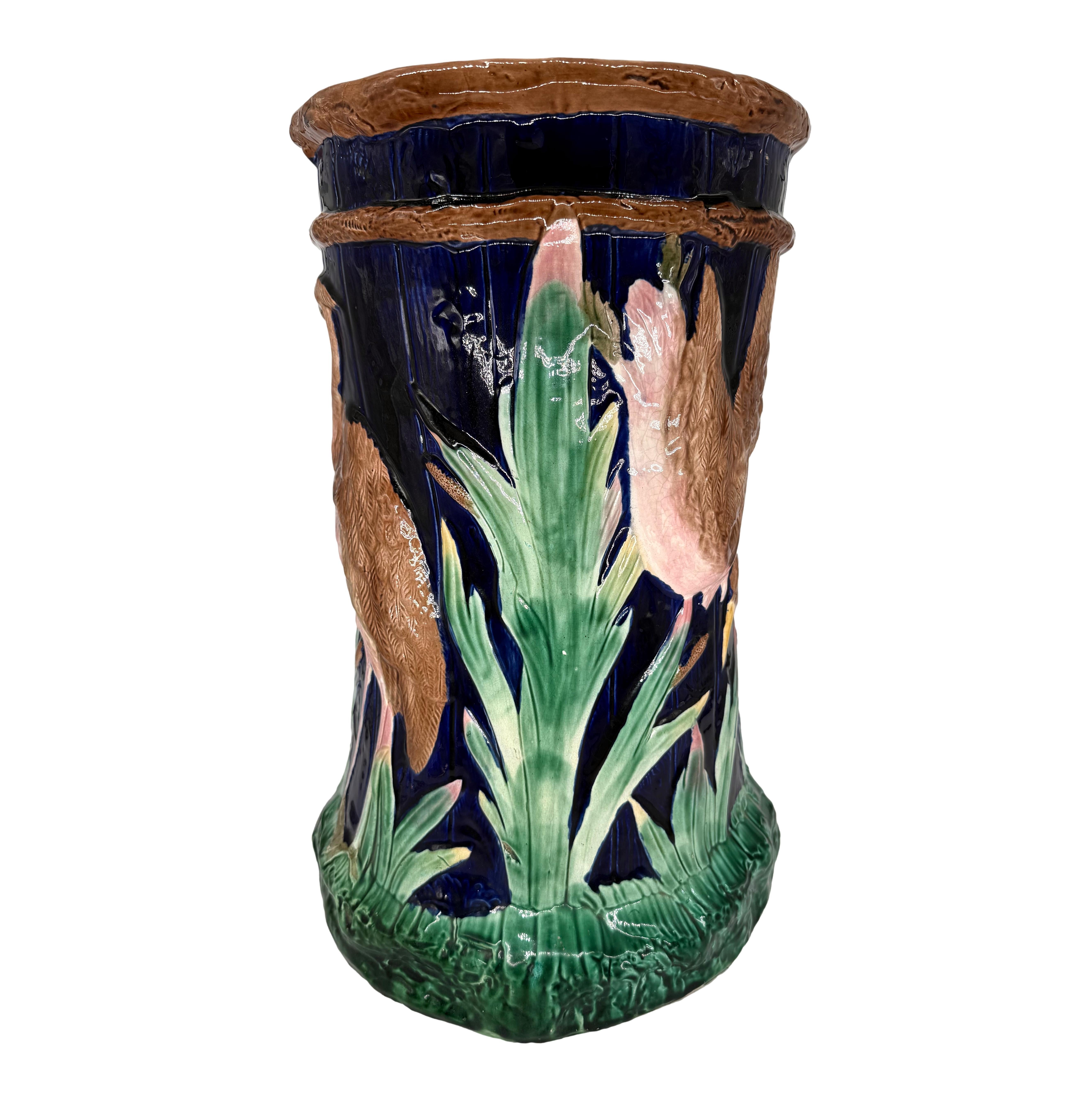 A Majolica Garden Seat by Simon Fielding, of cylinder-shape with a pair of relief molded storks in marsh to either side, with mottled top forming the seat, English, ca. 1880.
LITERATURE
Marilyn G. Karmason and Joan B. Stacke, MAJOLICA, A Complete