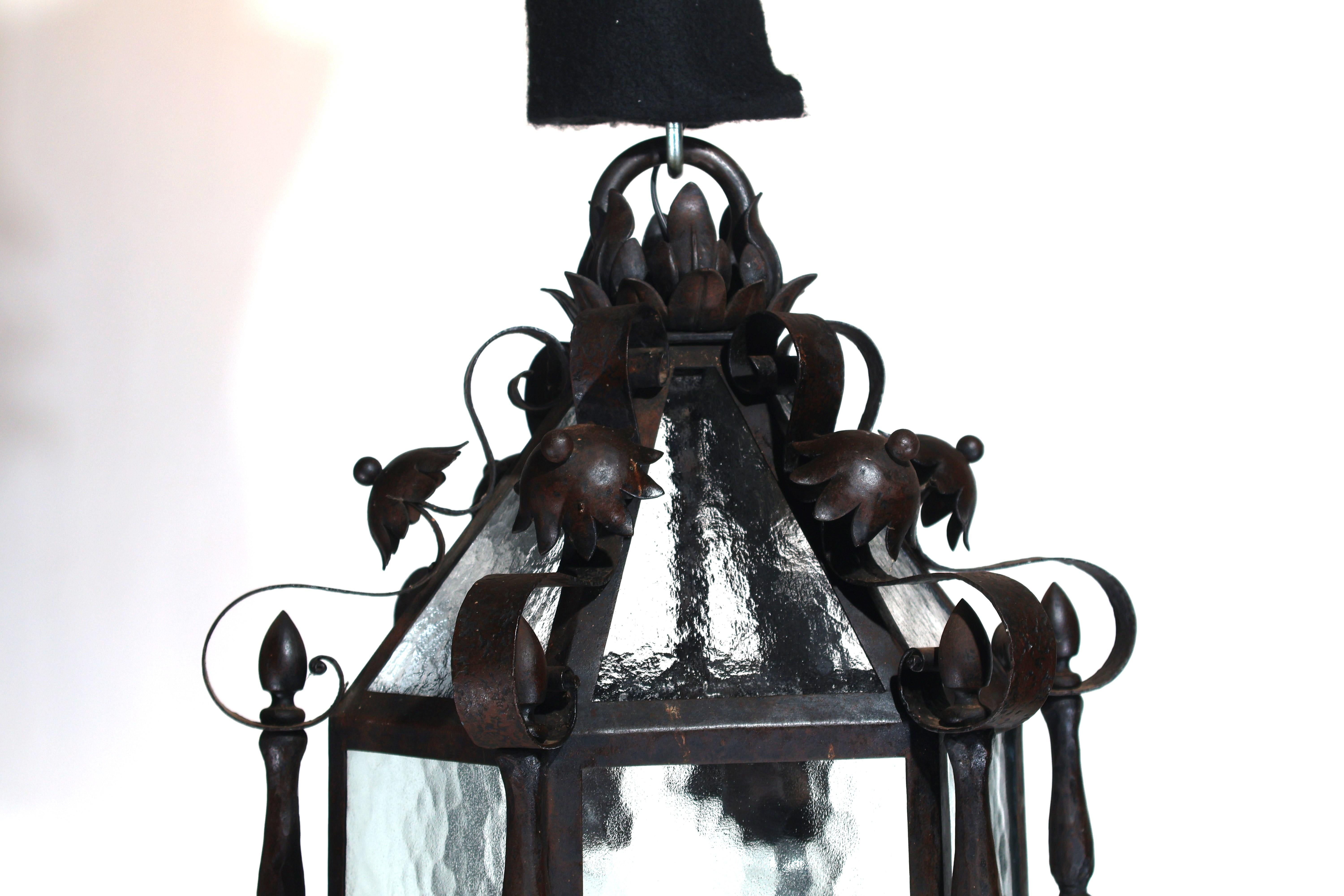 A Fine Hand Hammered Iron Lantern. Very Fine Detail. Glass panels. 
France, circa 1890.
Dimensions: Height 29