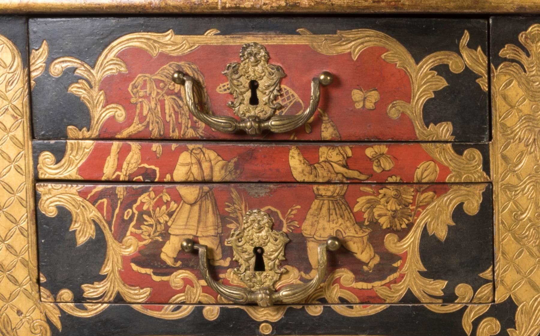 An extremely fine and rare 19th Century Italian Chinoiserie Bureau Plat. The tooled black leather writing surface within a painted and gilt patterned border, above central drawer with vignette depicting houses in landscape within foliate cartouche,