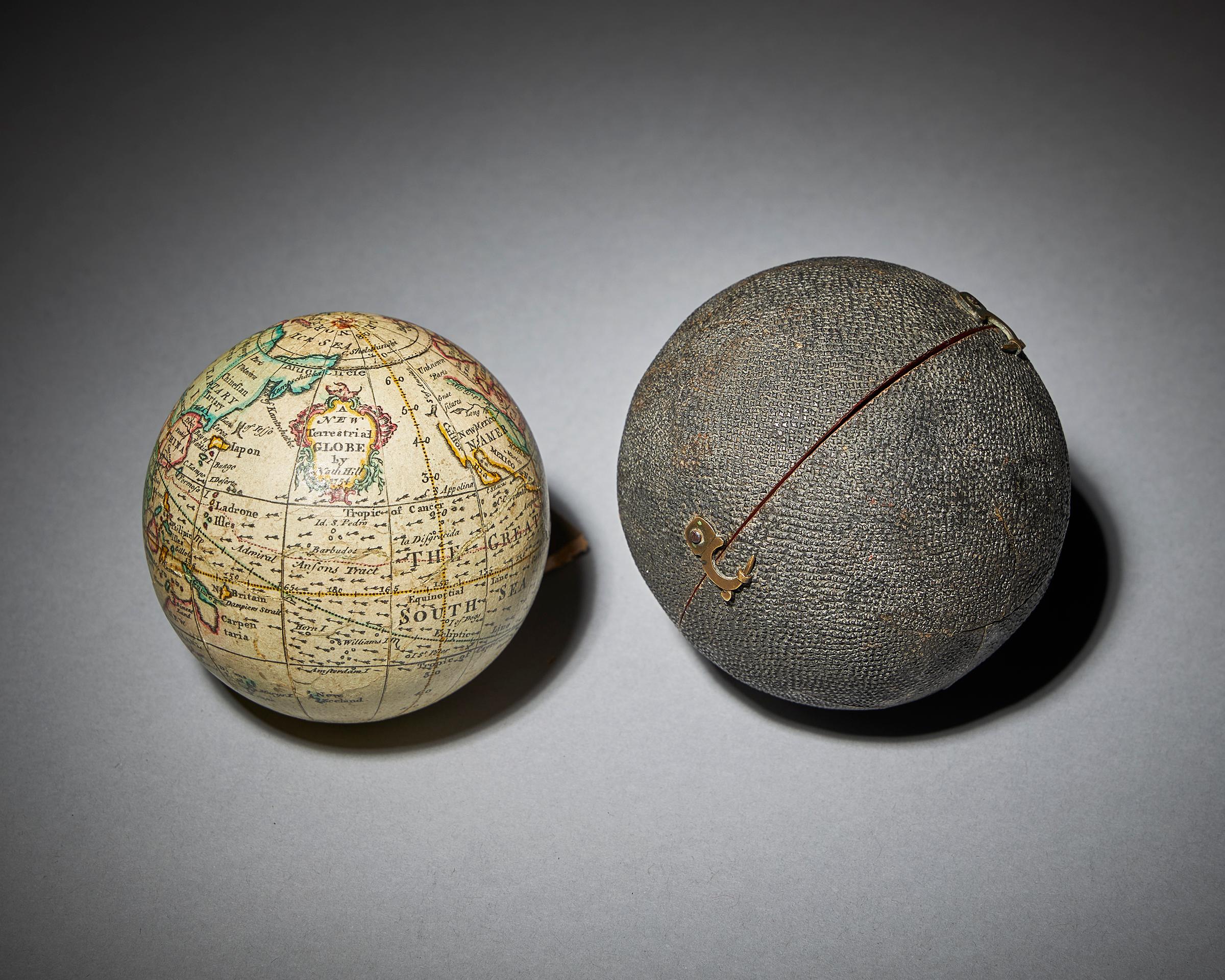 A fine and rare 18th century English terrestrial and celestial pocket globe by Nathaniel Hill in its original black pebbled fish skin case dated 1754 titled 