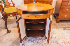 A fine 18th century George 111  satinwood and inlayed oval cabinet side table