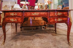 A fine 18th century Regence kingwood and gilt bronze mounted Louis XV desk