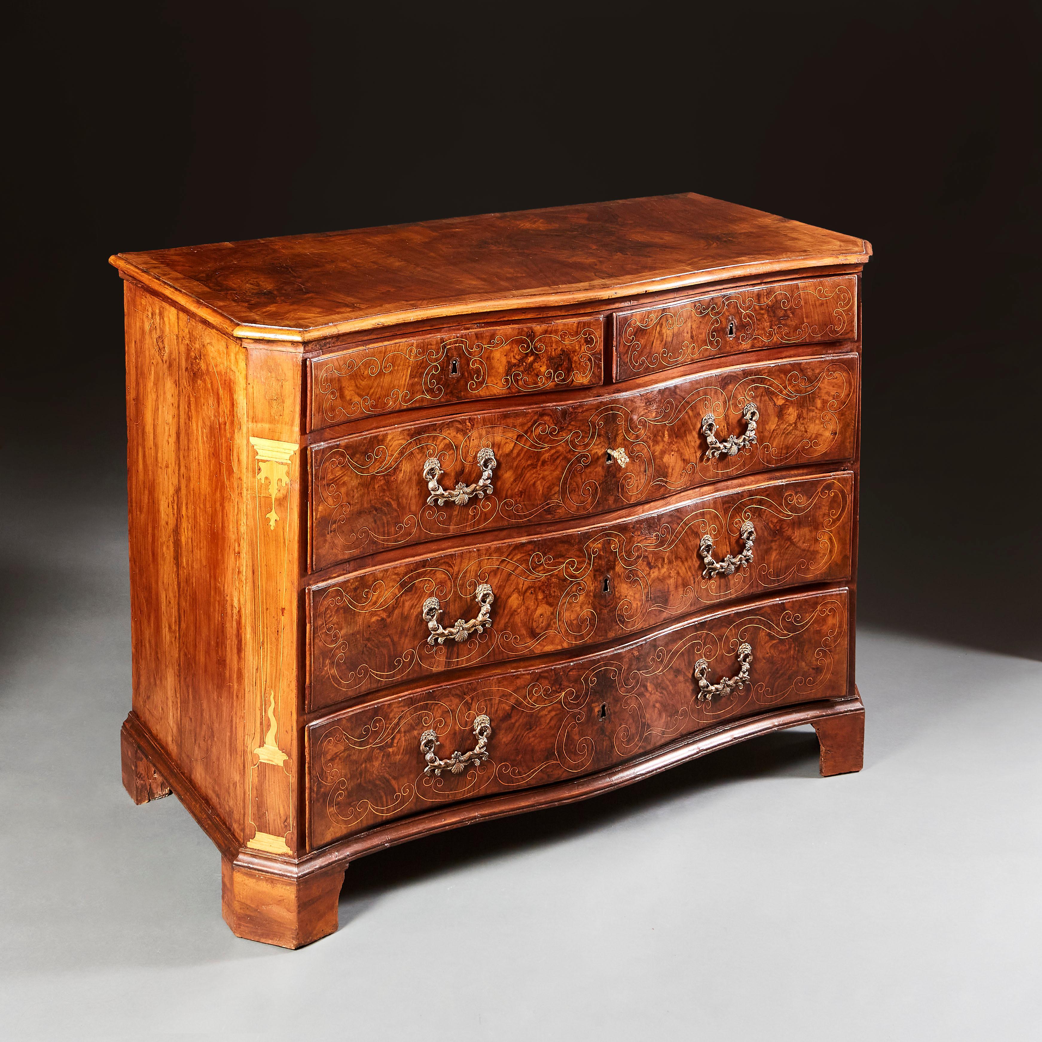 Italy, circa 1780

A fine late eighteenth century walnut serpentine commode, the drawer fronts decorated with fine box wood arabesques, handles of beaten bronze with scallop shells, quarter veneered top, all supported on bracket feet.

Height