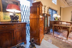 A fine 19th c Biedermeier birch secretary. Ebonized details and gilt bronze