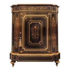 A fine 19th c French ebonized marble top cabinet, gilt bronze mounts by Diehl