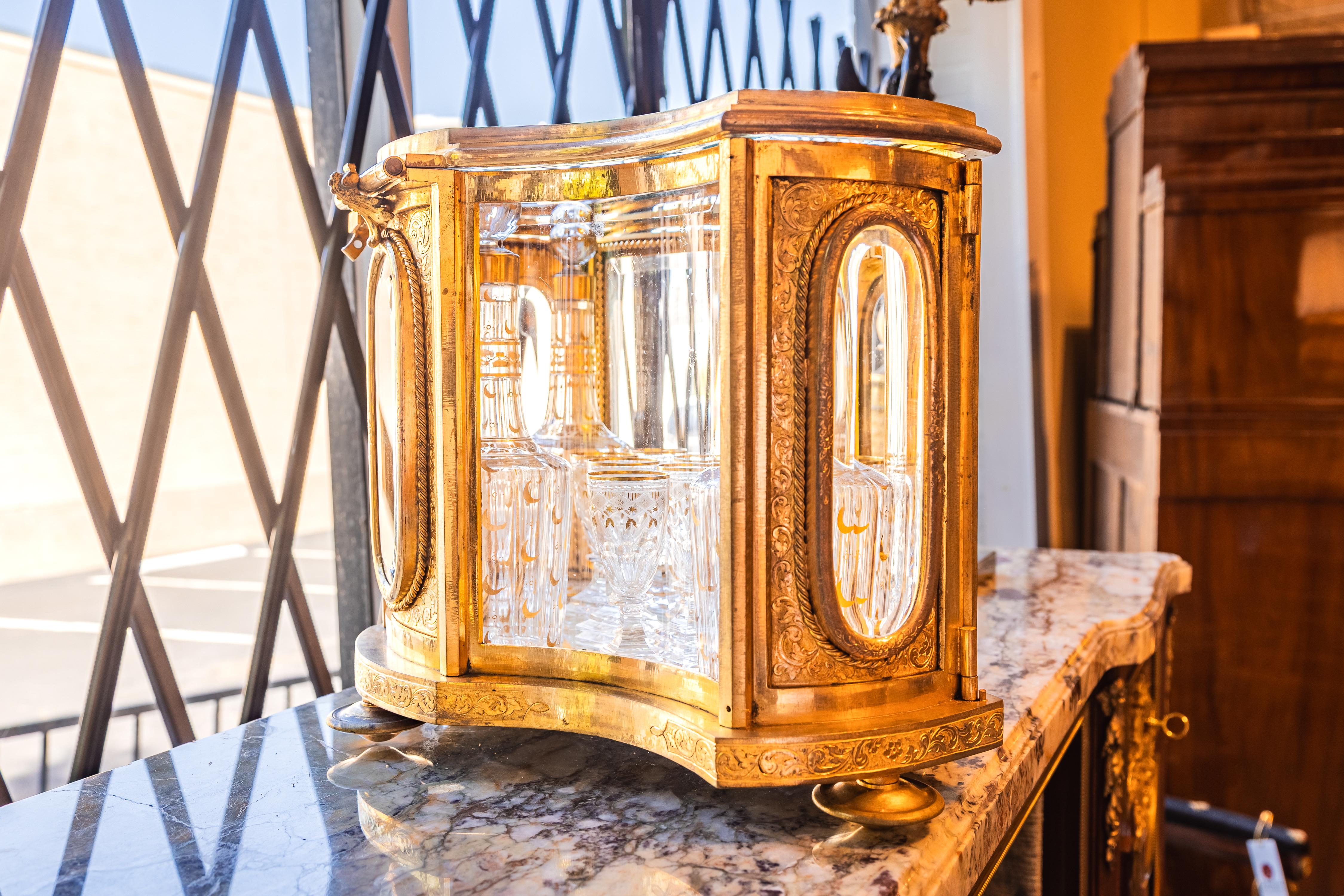 Bronze A  fine 19th c French Liquor set . Gilt bronze and glass with crystal decanters For Sale