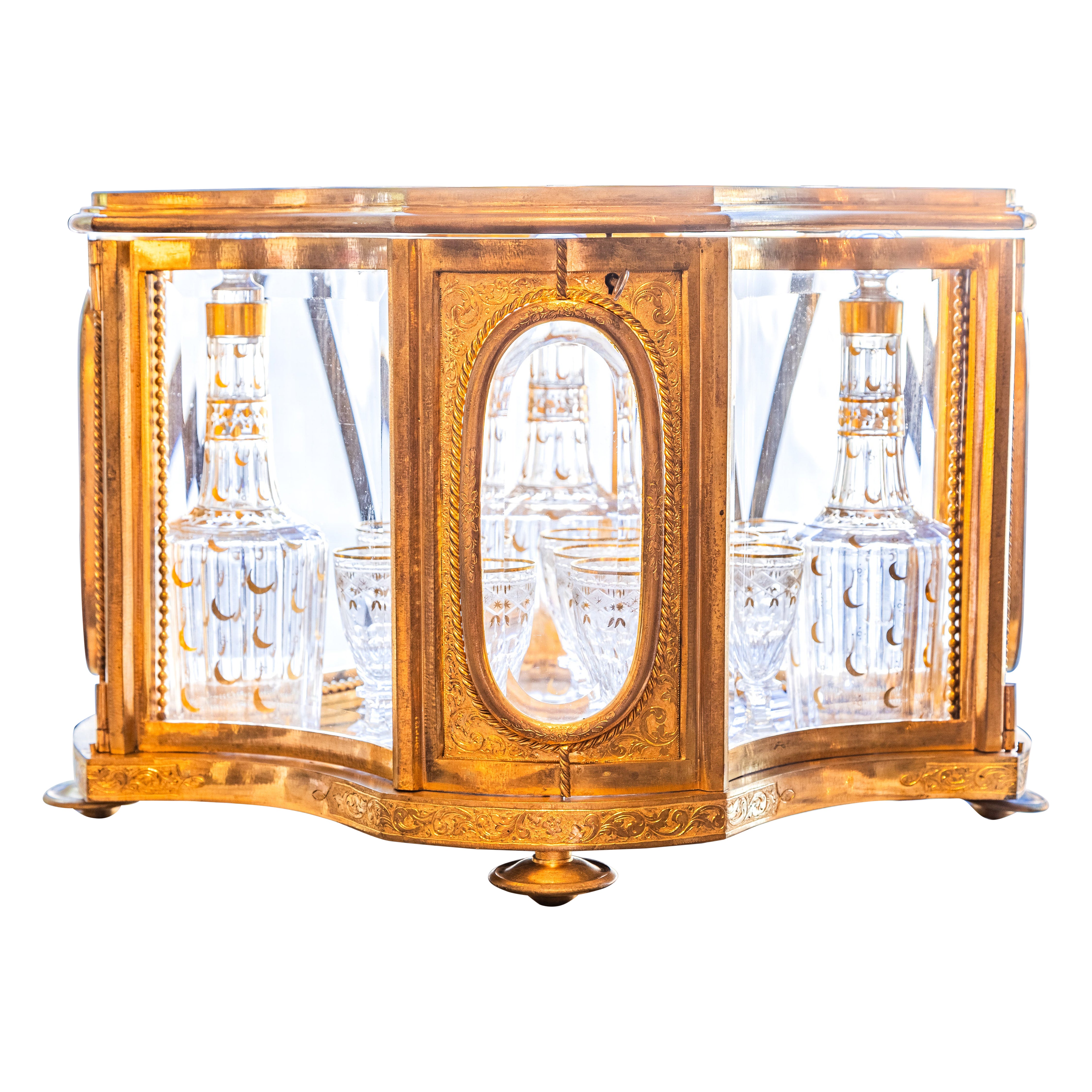 A  fine 19th c French Liquor set . Gilt bronze and glass with crystal decanters For Sale
