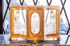 A  fine 19th c French Liquor set . Gilt bronze and glass with crystal decanters