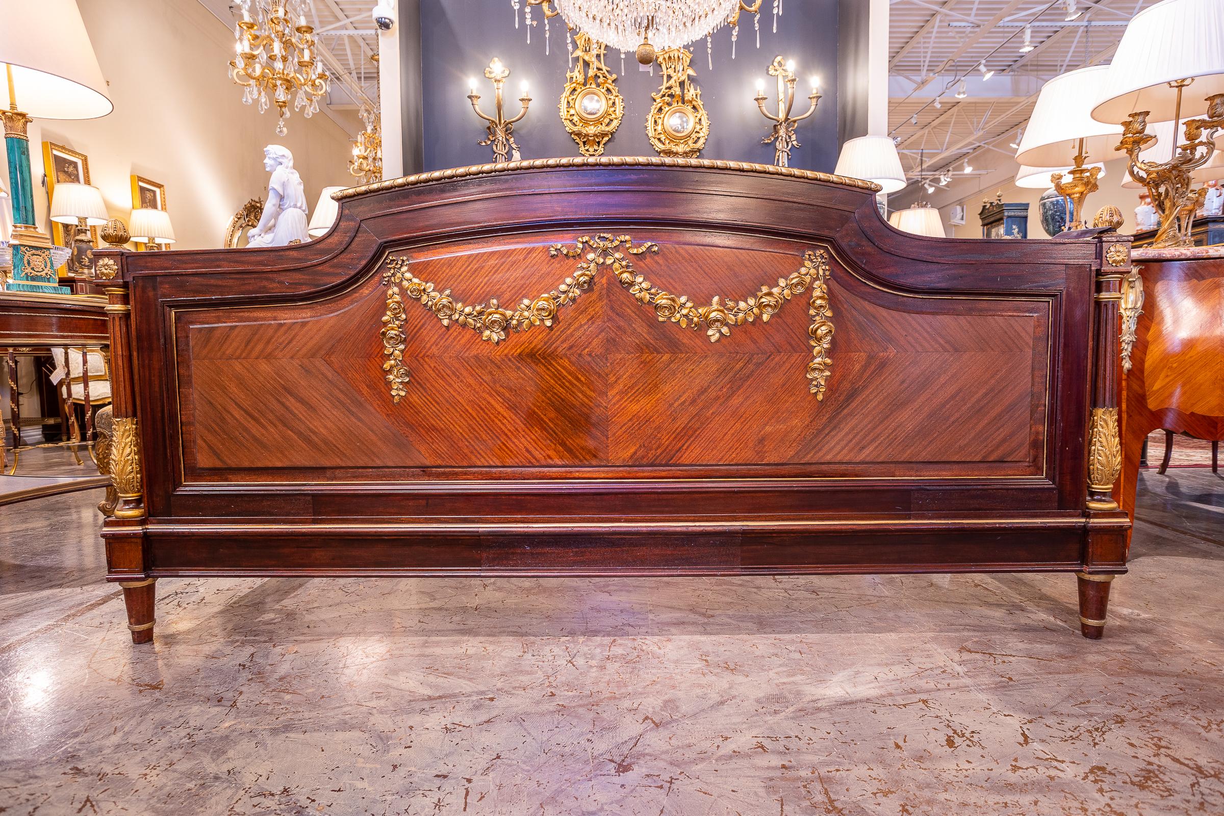 Gilt A fine 19th c French Louis XVI kingwood and rosewood parcel gilt carved King bed