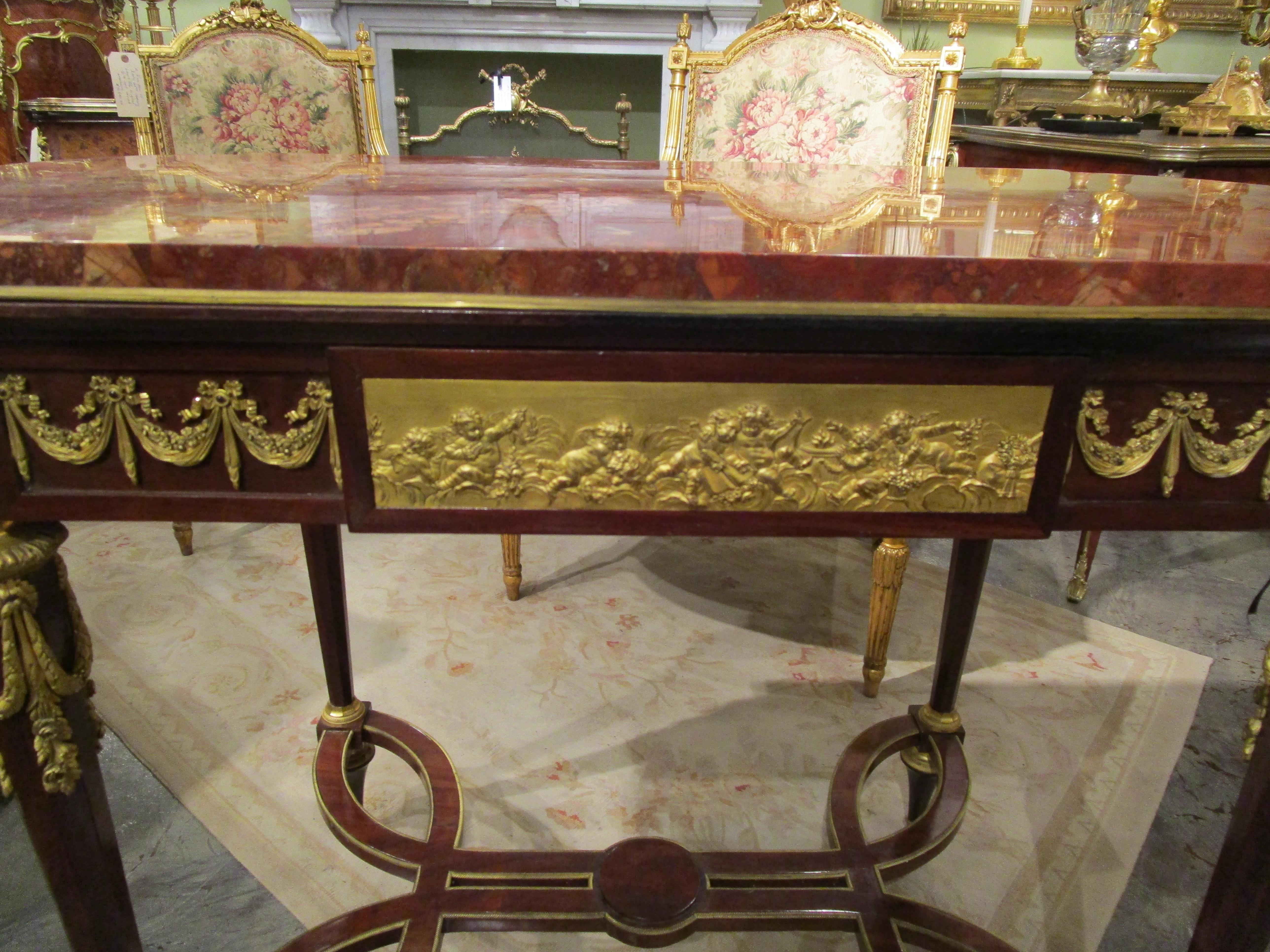 A fine 19th century French mahogany and gilt bronze mounted Louis XVI marble top table . Finest gilt bronze Louis XVI mounts . Secret mechanical drawer . 