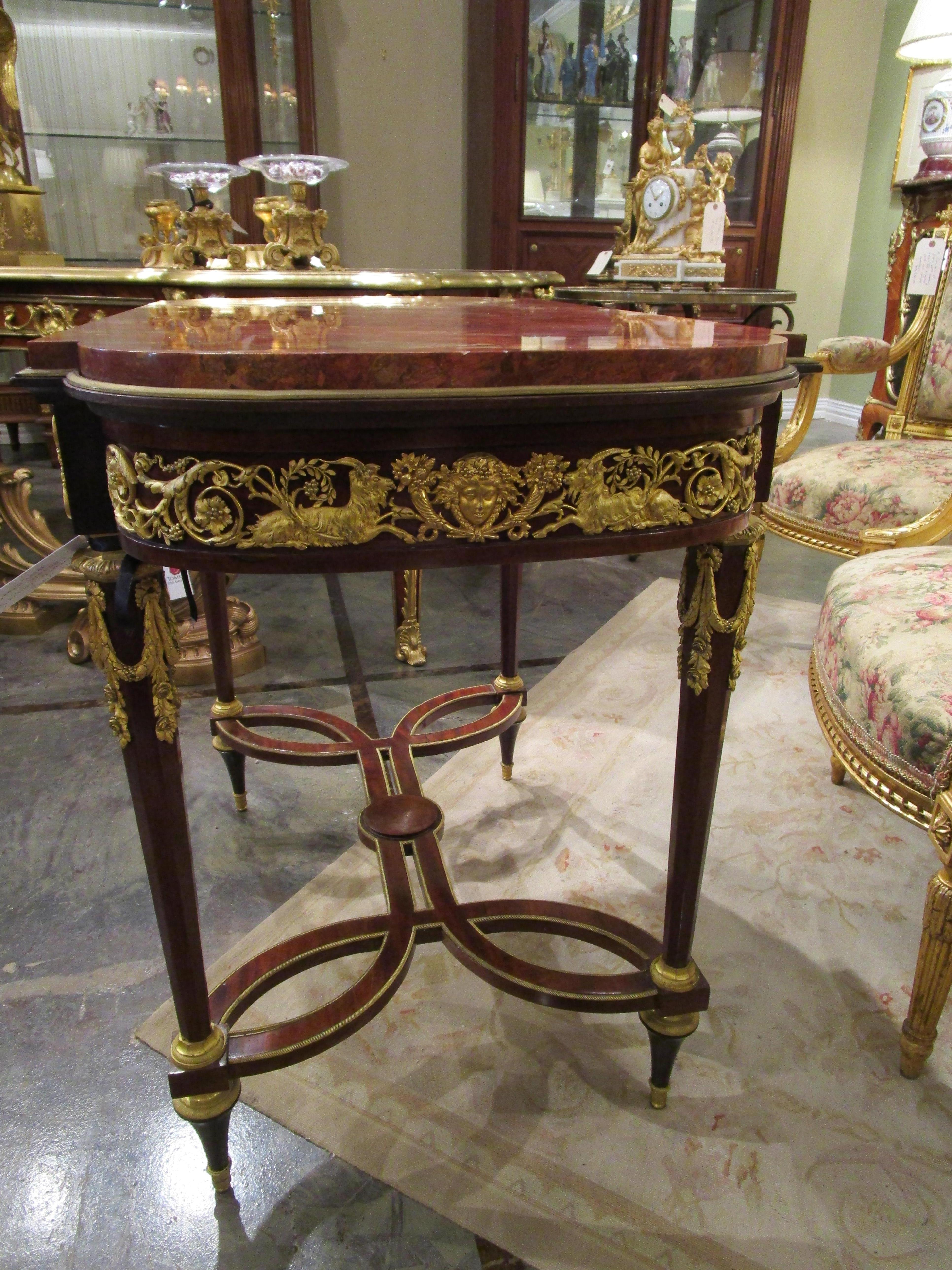 19th Century A fine 19th c French Louis XVI mahogany and gilt bronze mounted centertable