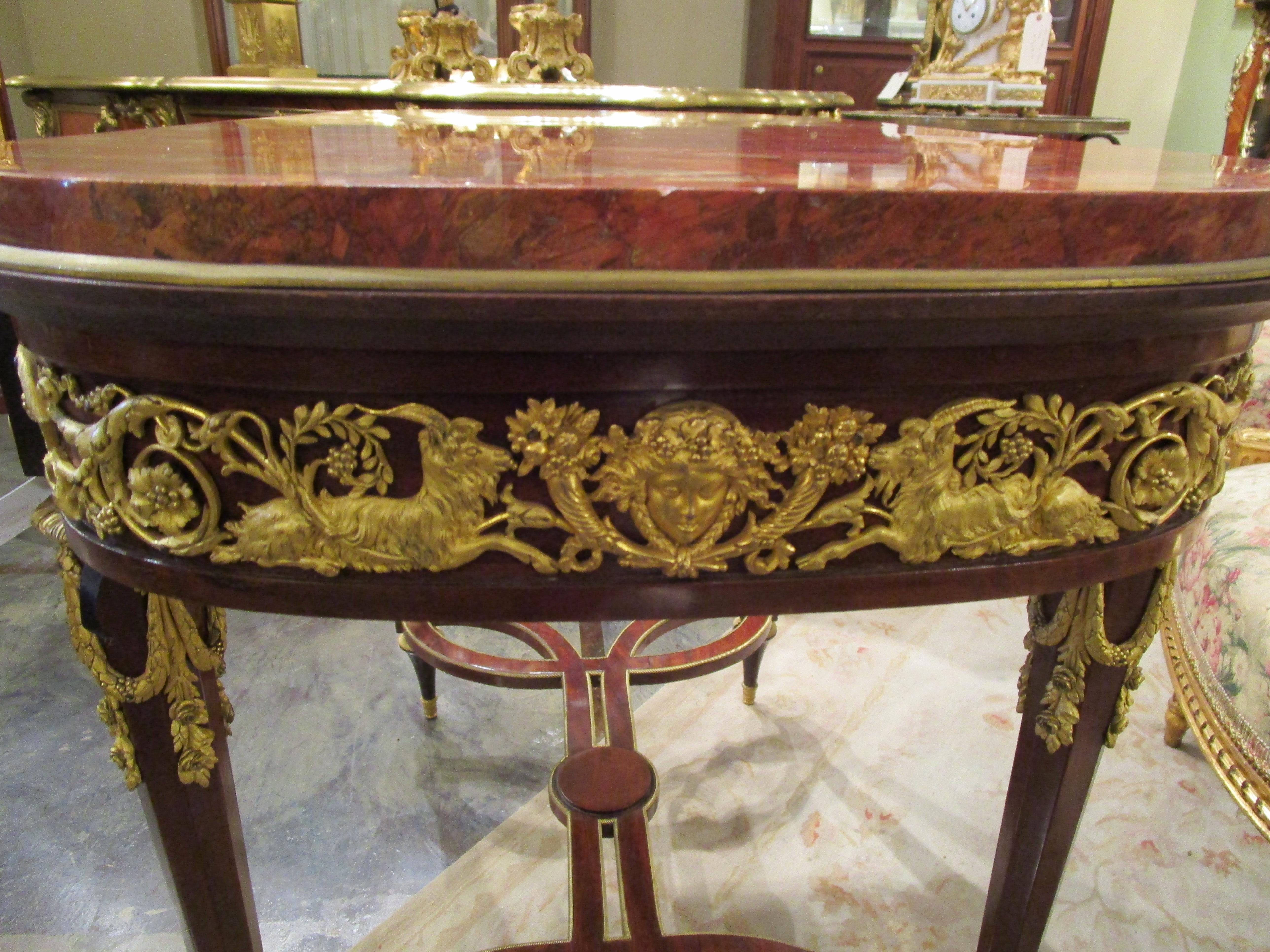 Bronze A fine 19th c French Louis XVI mahogany and gilt bronze mounted centertable