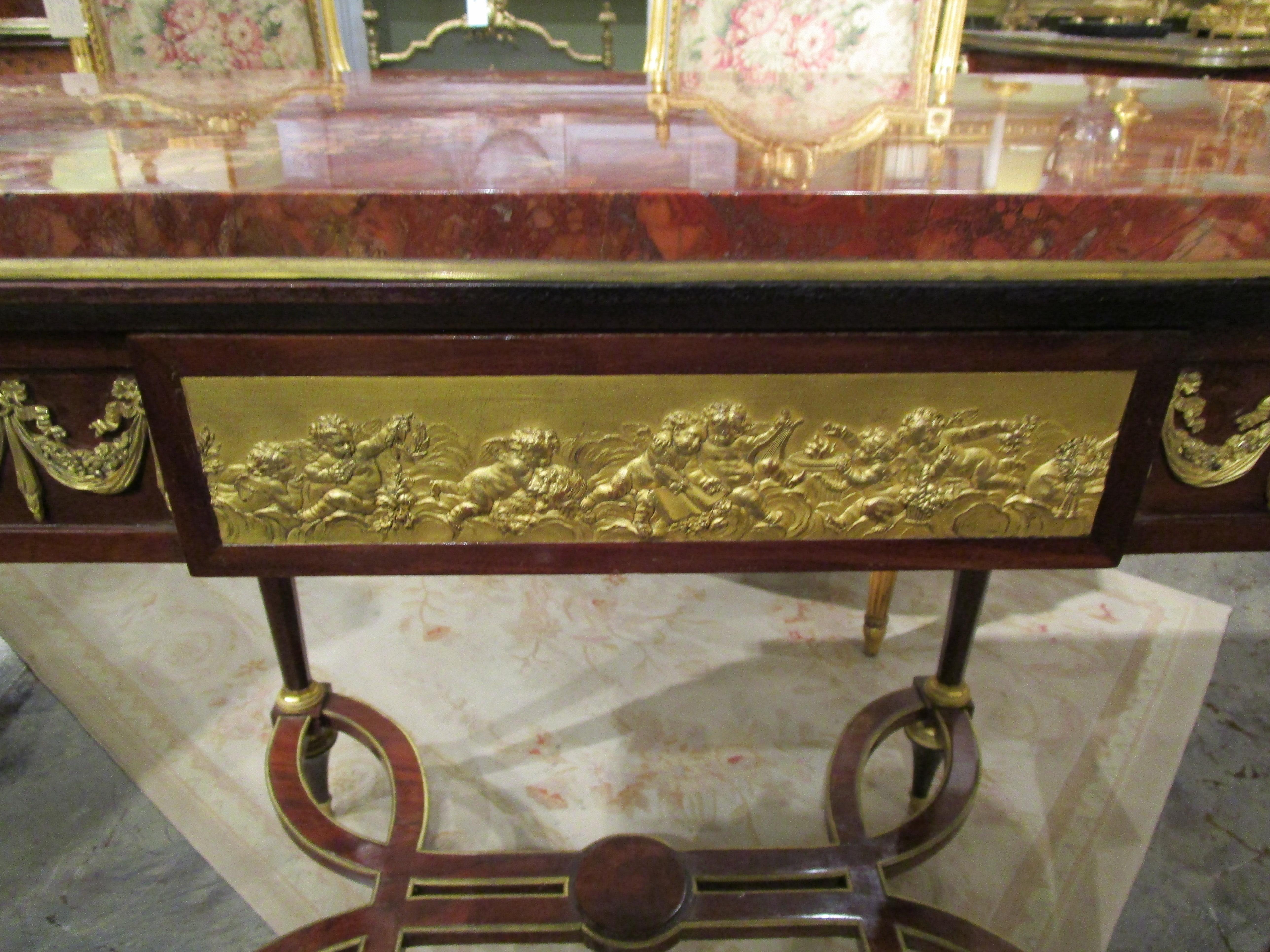 A fine 19th c French Louis XVI mahogany and gilt bronze mounted centertable 2