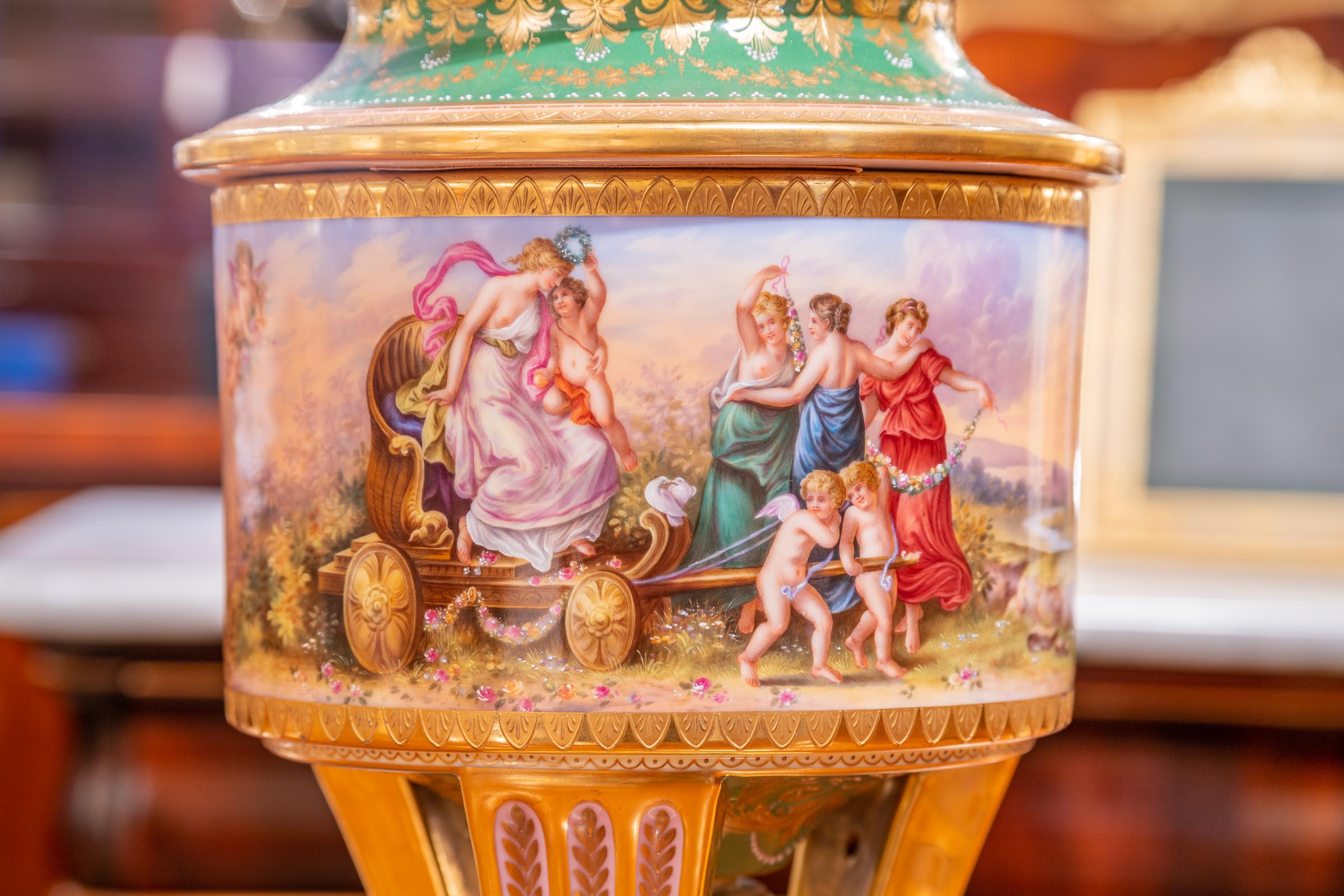 A fine 19th century Austrian Royal Viennese porcelain urn with hand painted classical scenes. Very fine detailed decoration.