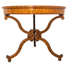 A fine 19th century Continental fruitwood and inlayed center table .