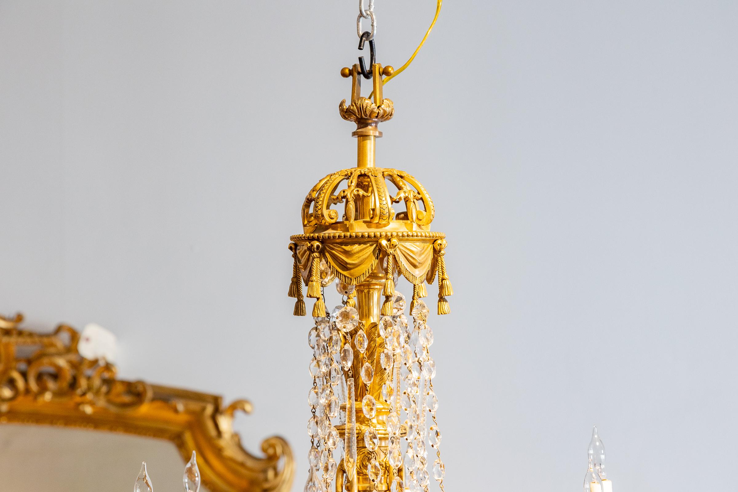 A fine 19th century French Louis XVI gilt bronze and crystal chandelier.