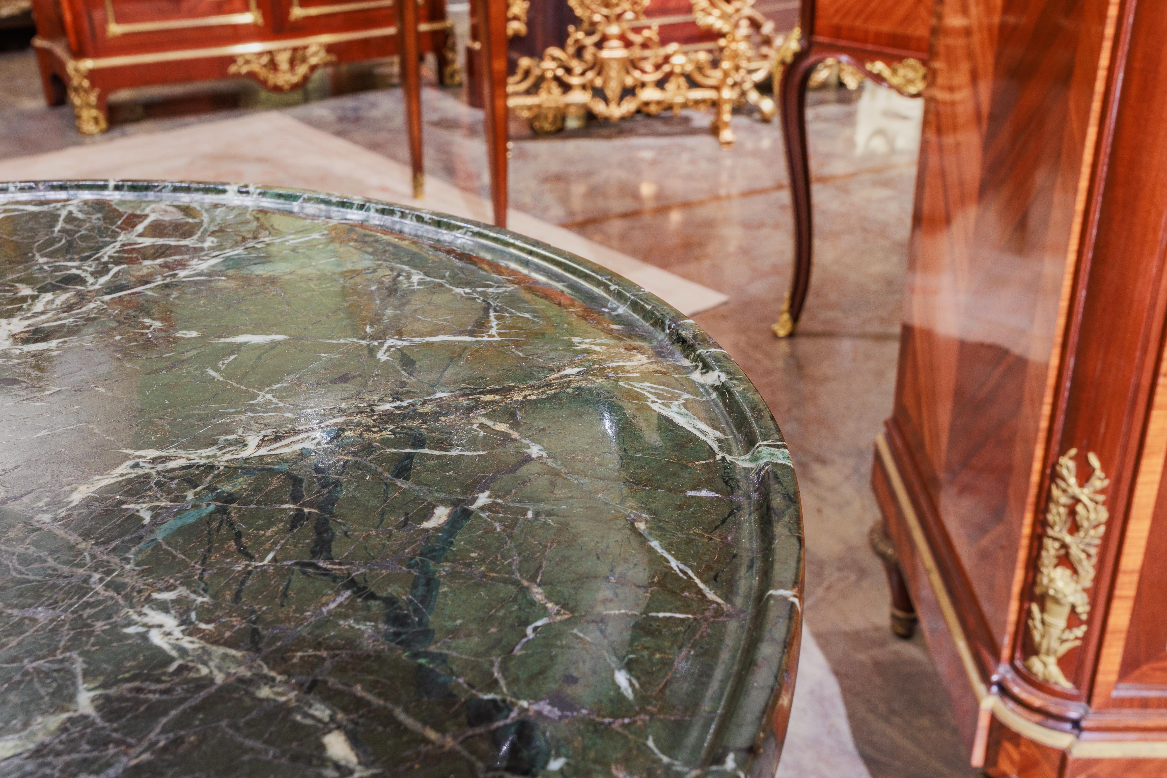 19th Century A fine 19th century French Empire marble top and  gilt bronze gueridon For Sale