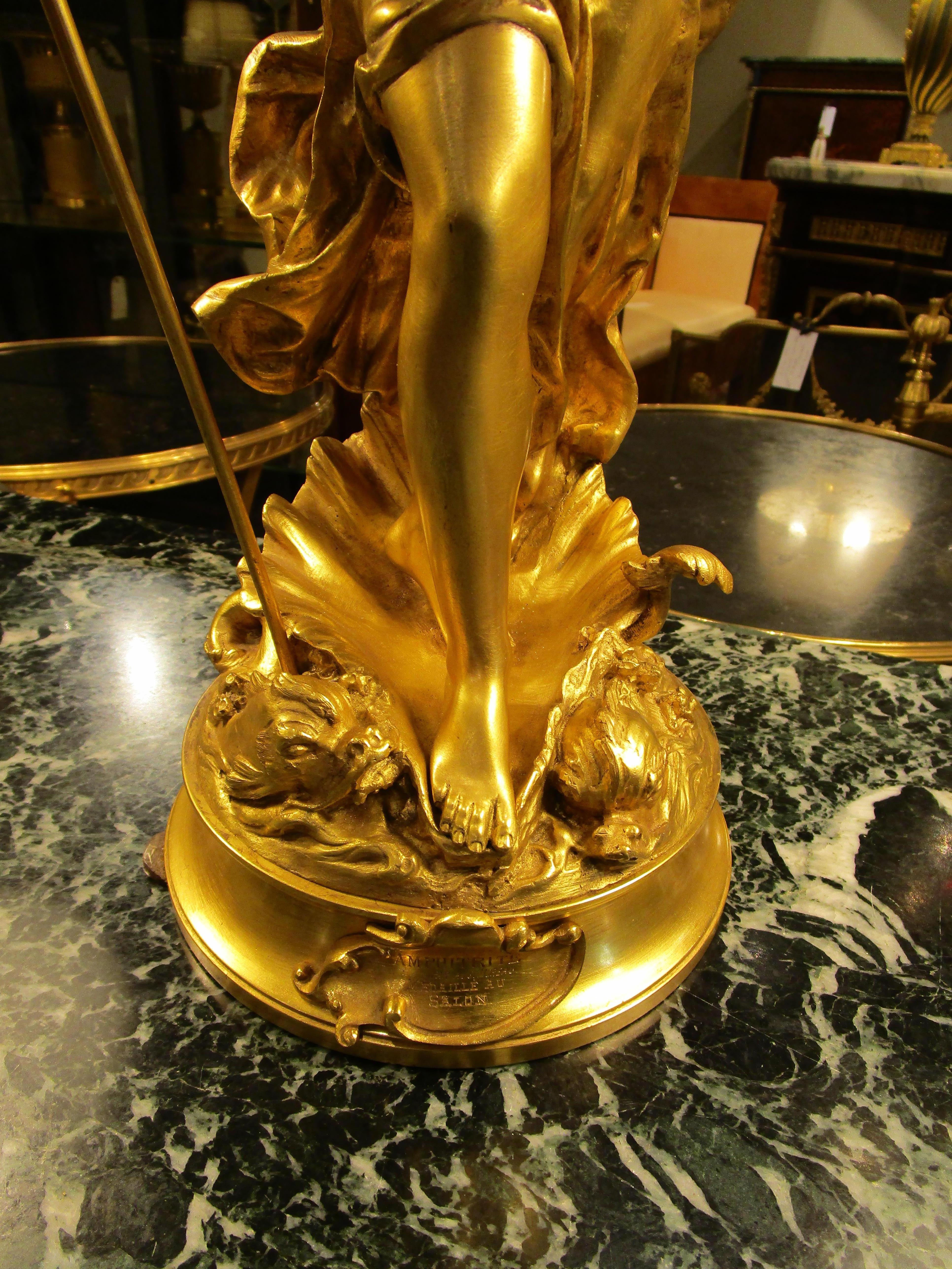 A fine 19th century French gilt bronze sculpture of Amphitrite by Auguste Moreau. Fine quality gilt bronze depicting Amphitrite with her dolphins on either side. The wife of Poseidon goddess of the sea. 