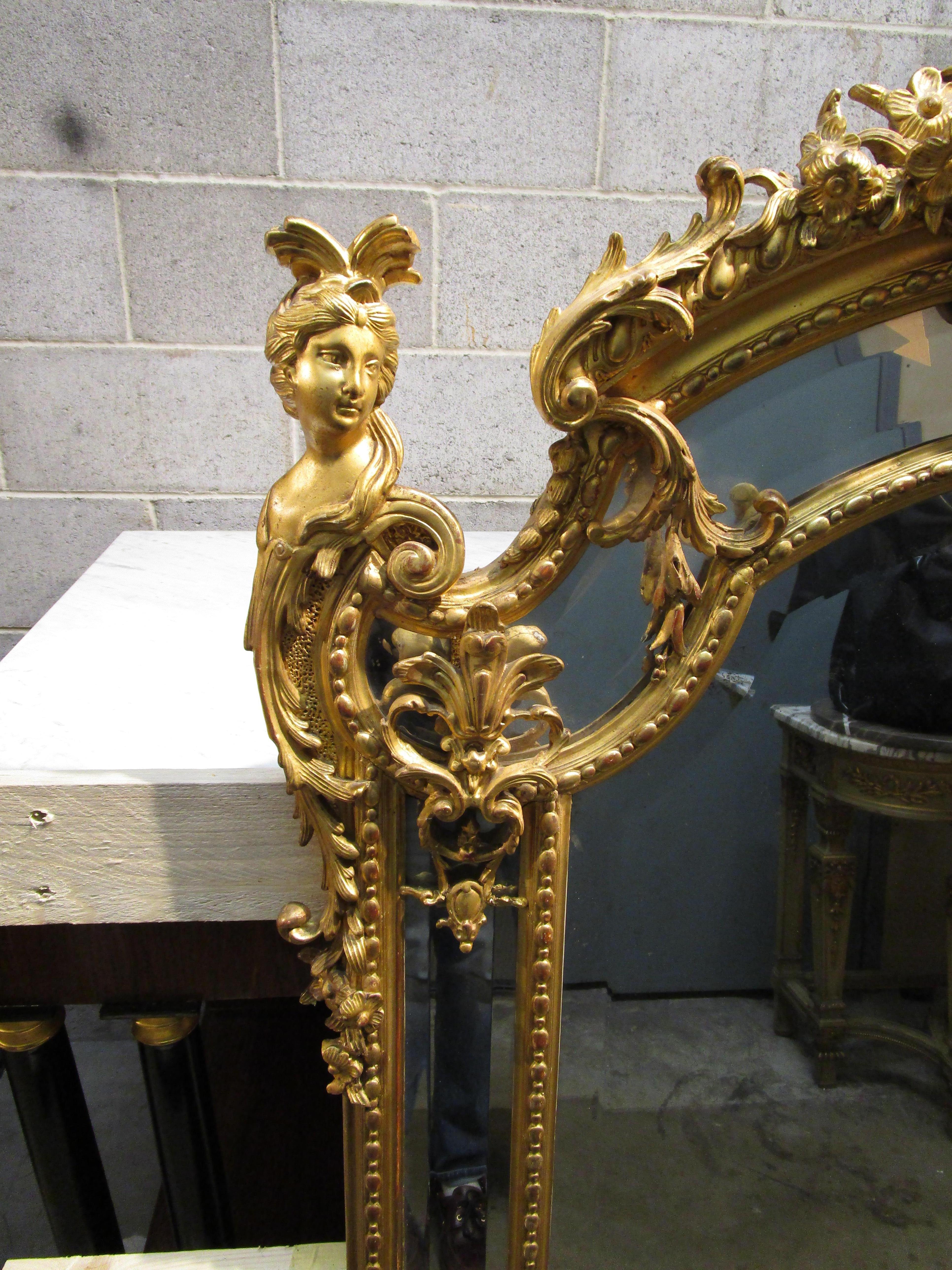 A very fine 19th century French gilt water gilt carved mirror with the finest details. Triple beveled.