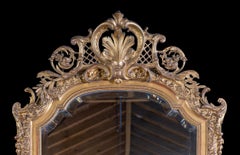A Fine 19th Century French Gilt Gesso Overmantel Mirror with a Bevelled Plate