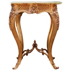 Raffinato tavolo gueridon francese Luigi XV del XIX secolo in bronzo dorato e onice