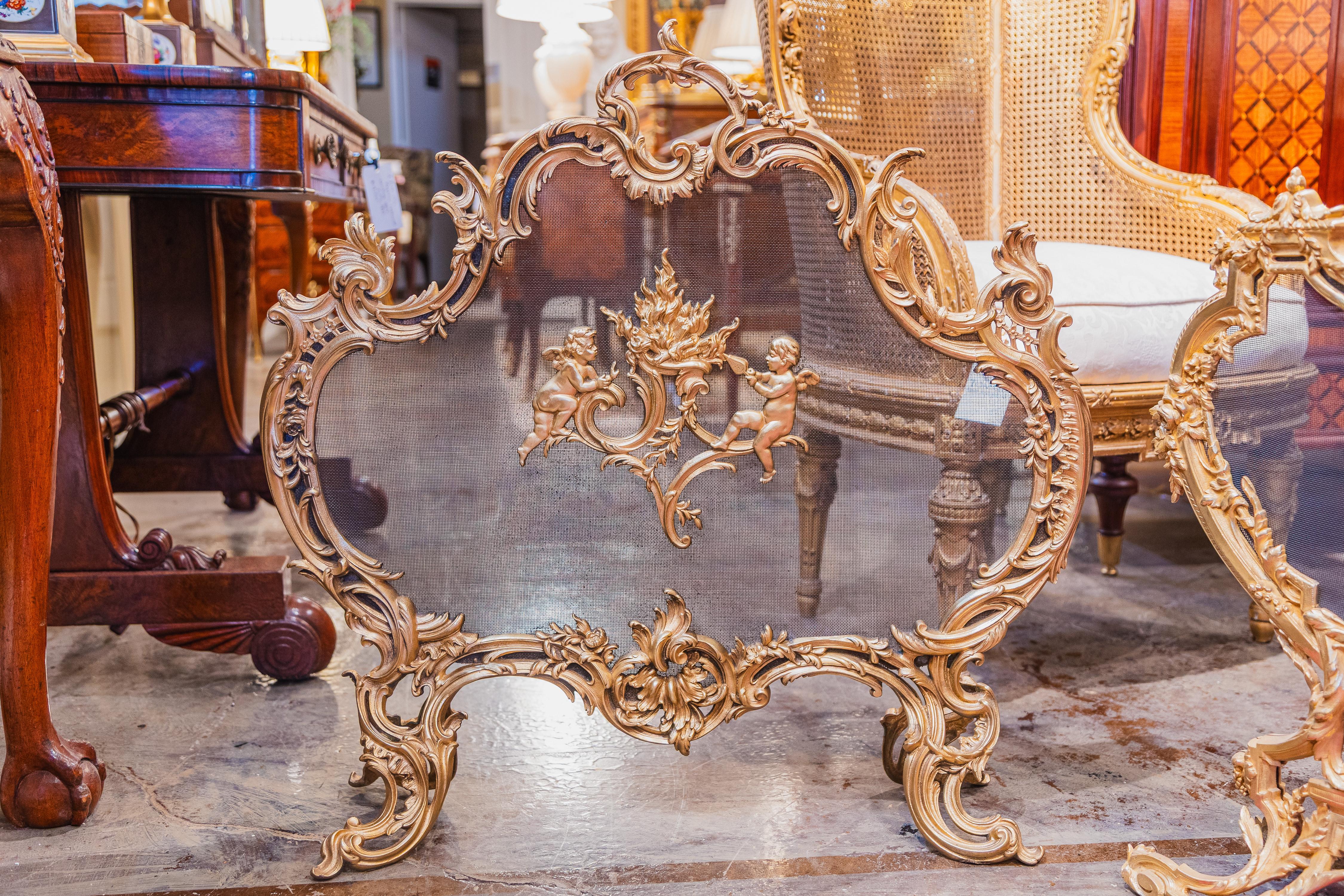 A fine 19th century French Louis XV gilt bronze firescreen