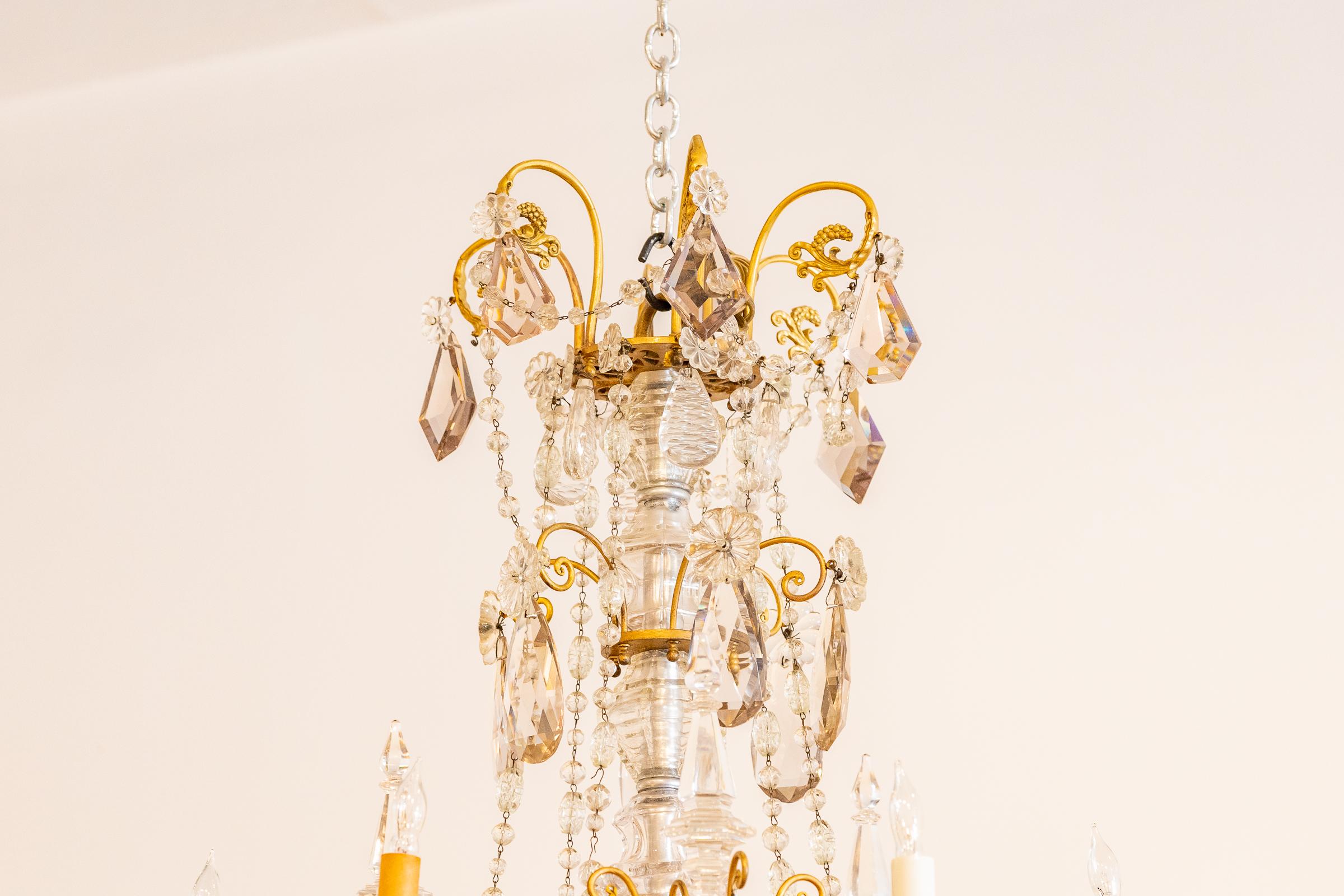 A fine 19th century 6 light Louis XV gilt bronze and rock crystal chandelier.