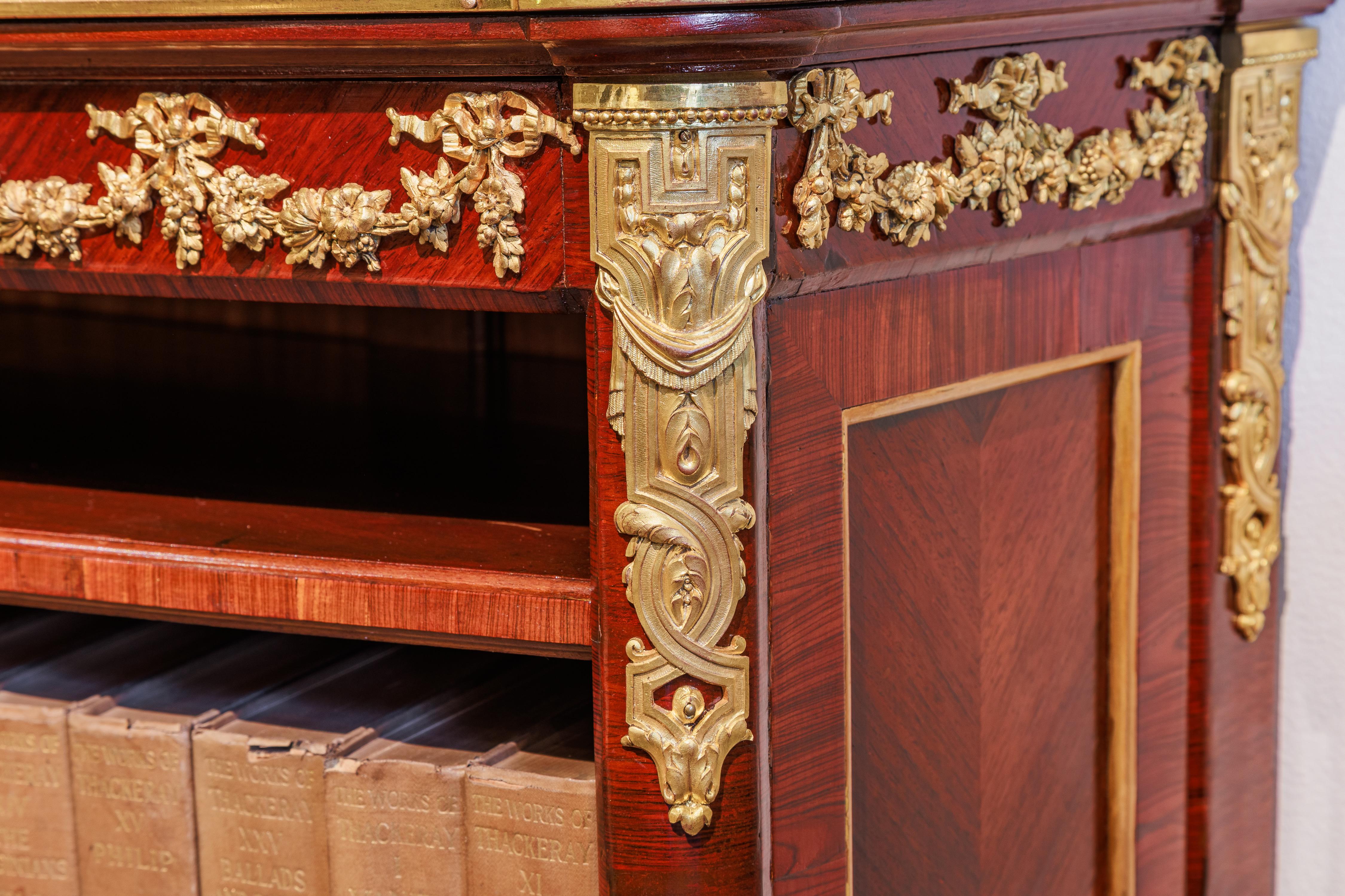 A fine 19th century French Louis XVI mahogany and gilt bronze mounted bookcase In Good Condition In Dallas, TX